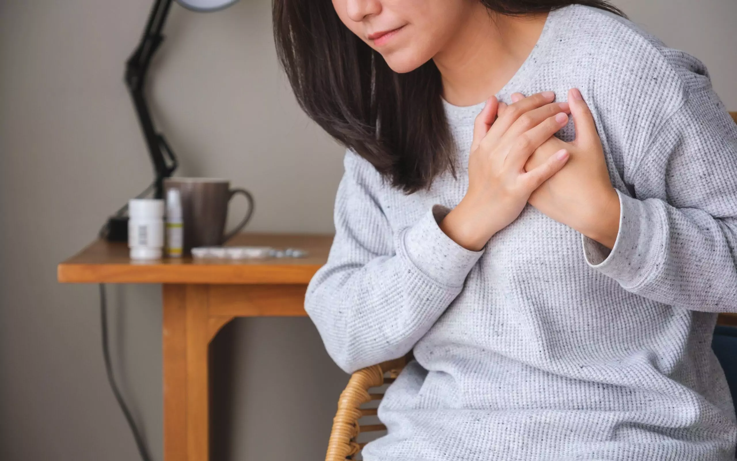 closeup image of a woman with hands on chest sudd 2024 12 02 19 56 34 utc