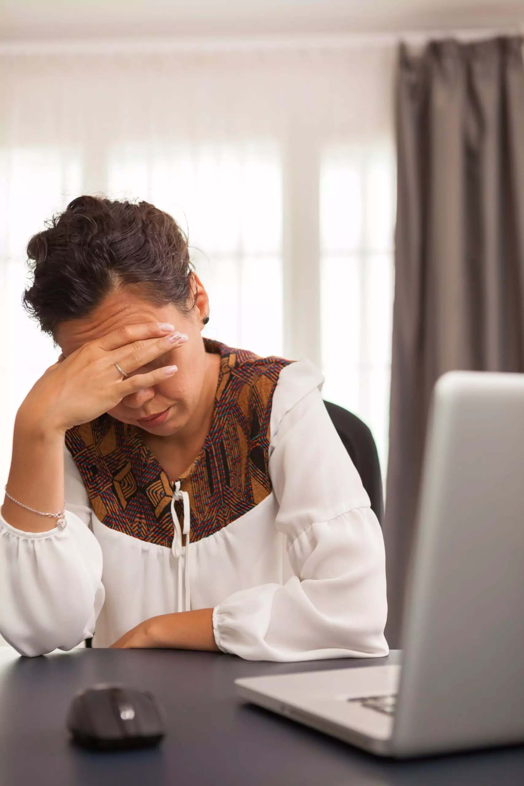 freelancer woman covering her face 2025 02 17 06 41 01 utc