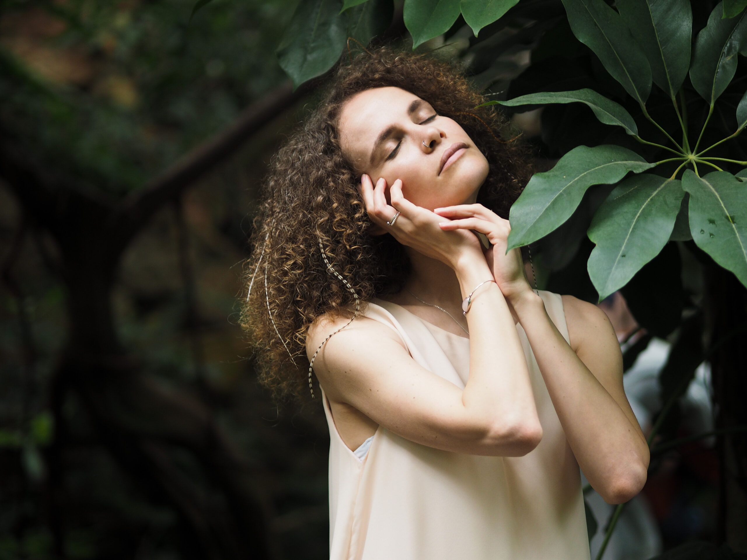 side view of pretty curly woman in beige dress wit 2025 01 16 12 50 19 utc