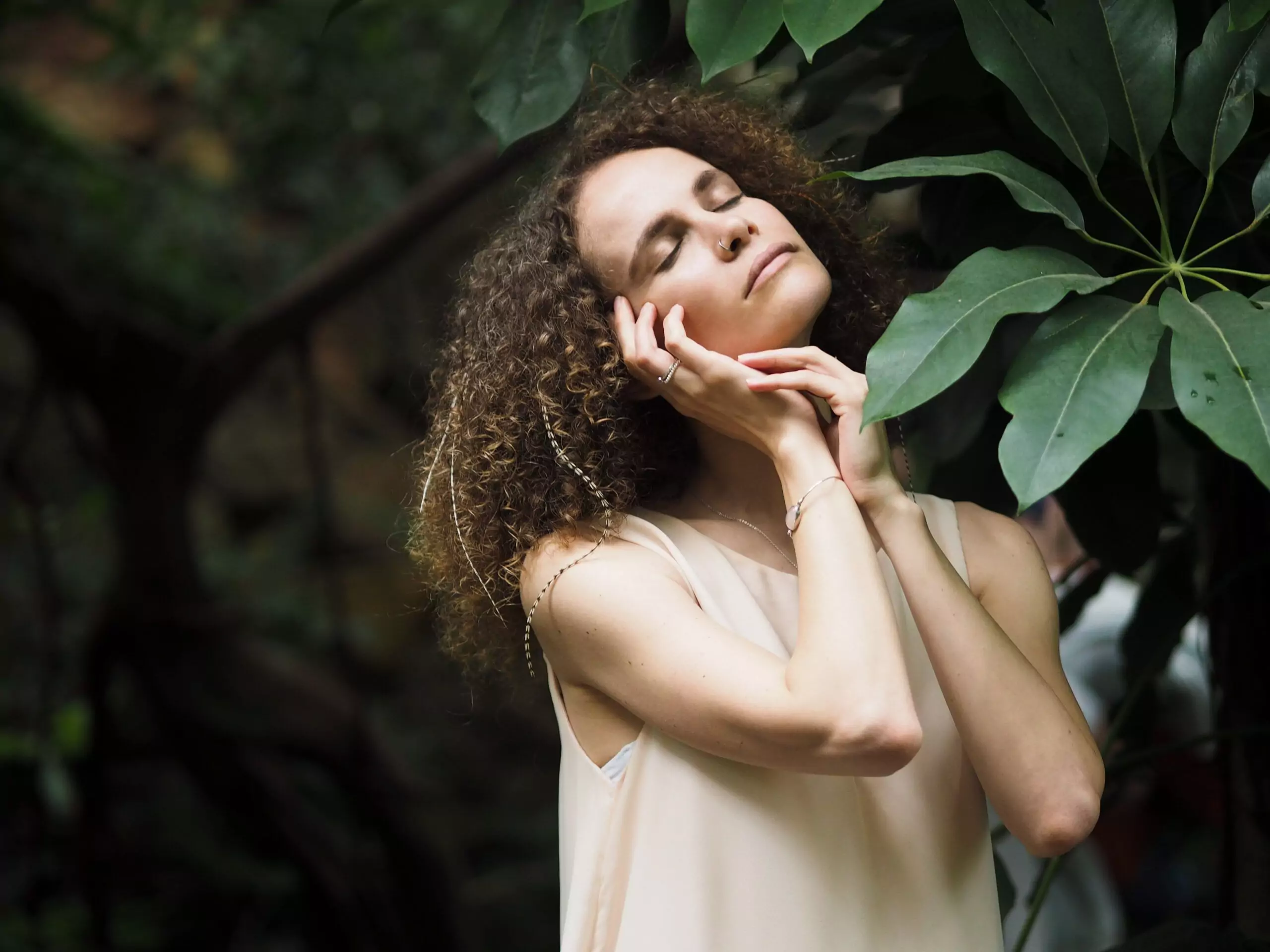 side view of pretty curly woman in beige dress wit 2025 01 16 12 50 19 utc